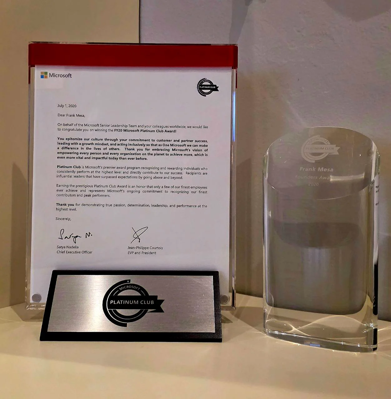 Frank Mesa's Microsoft Platinum Club award, recognition letter, and Founders Award trophy